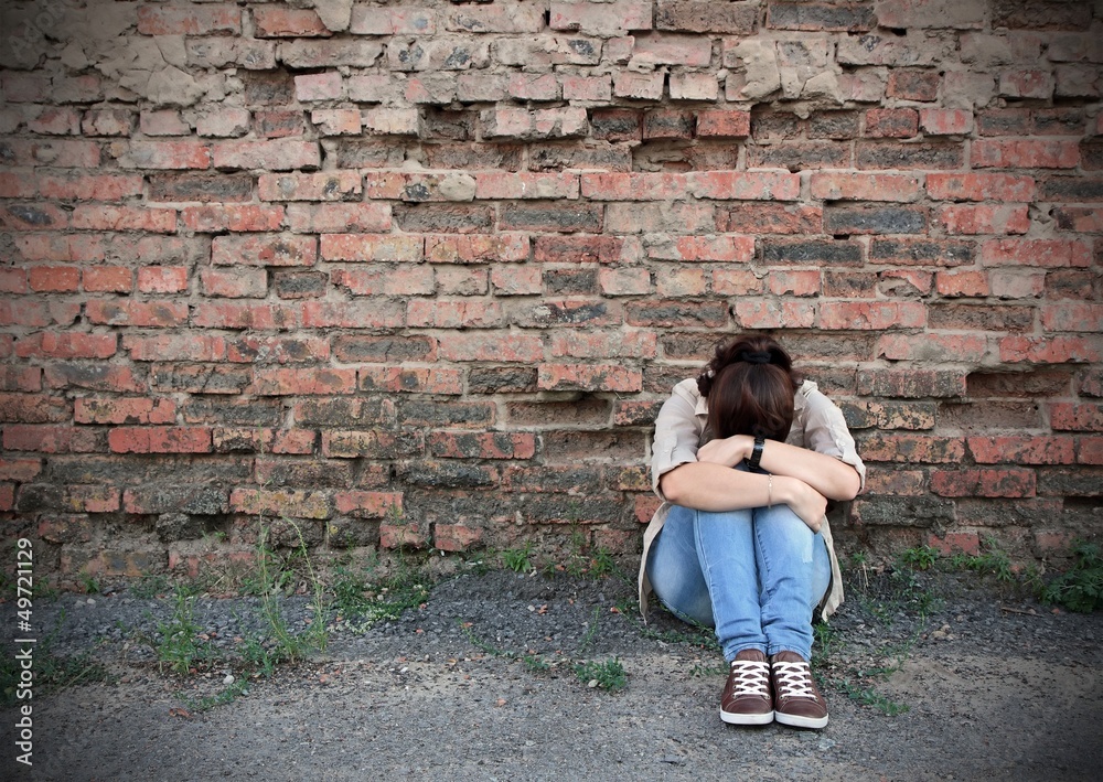 Fototapeta premium Young woman in despair