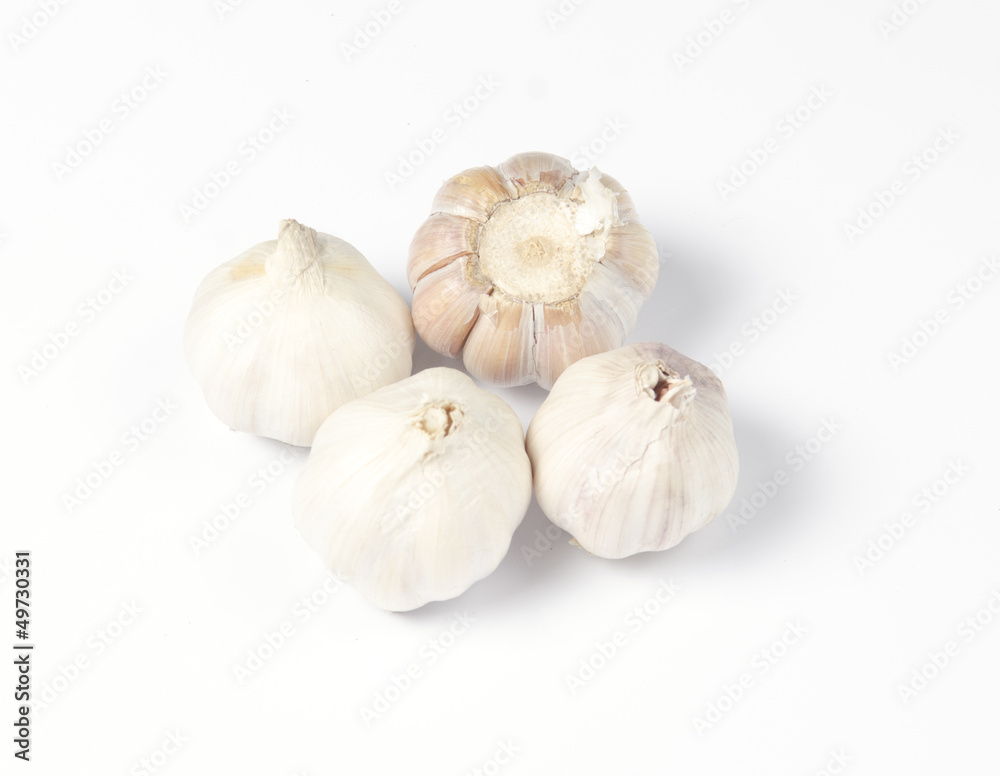 Garlic head detail isolated on white background Garlic head detail isolated on white background