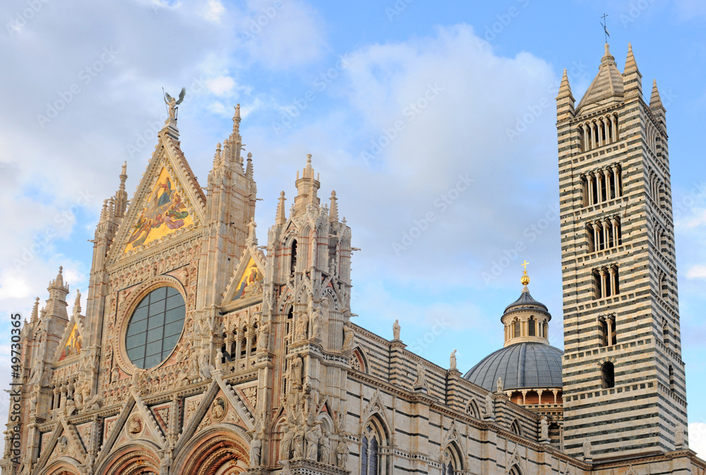 duomo or cathedral clouded sky in siena, italy