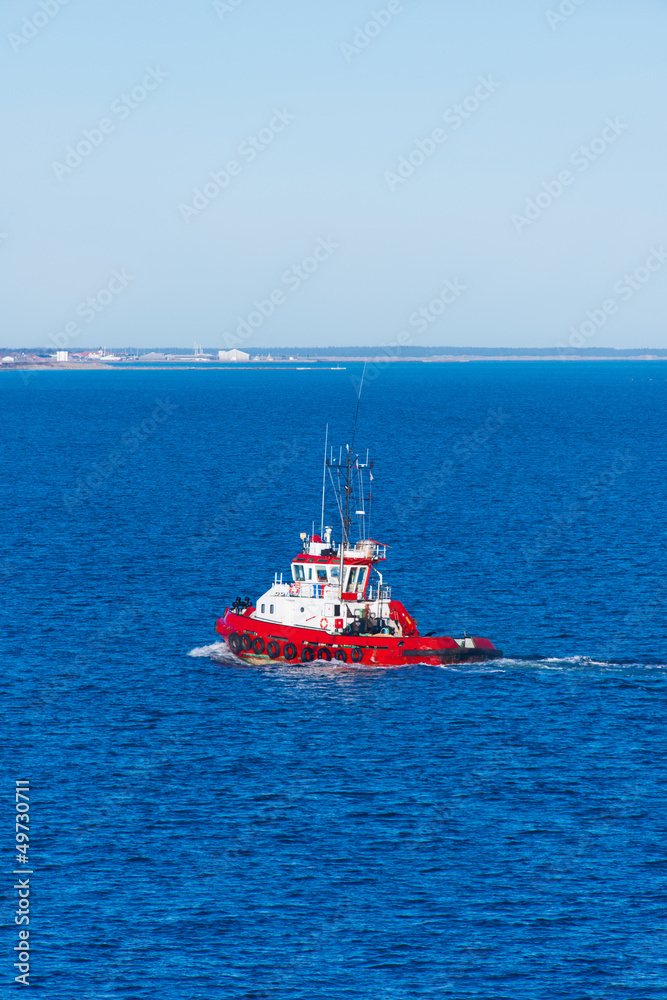 Tugboat at blue sea Tugboat at blue sea