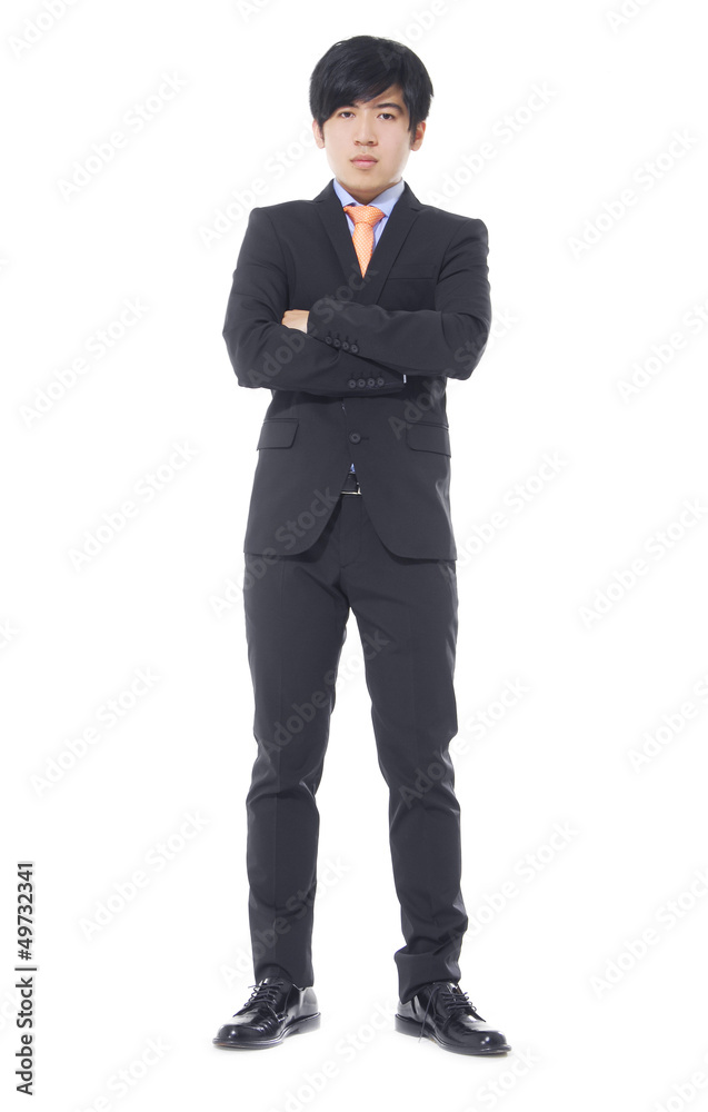 Asian business man standing with crossed arms over white Asian business man standing with crossed arms over white