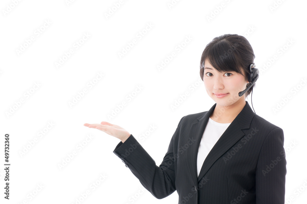 a young businesswoman with headset showing a young businesswoman with headset showing