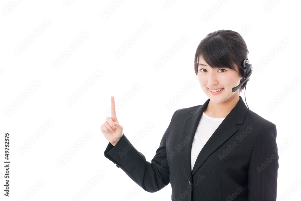 a young businesswoman with headset showing a young businesswoman with headset showing