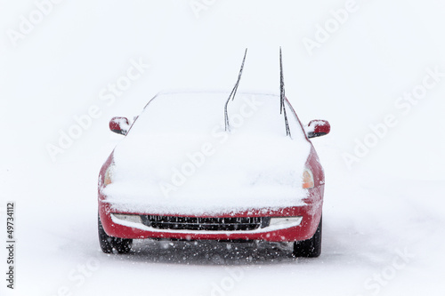 Parked Car in Winter Snowstorm photo