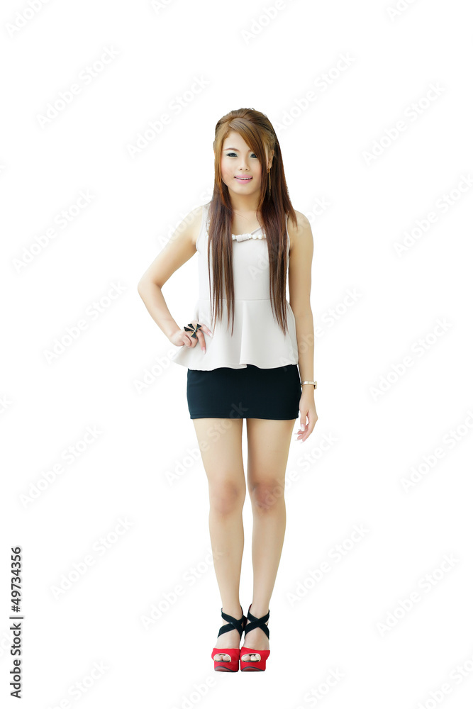 Portrait young beautiful casual woman standing isolated against Portrait young beautiful casual woman standing isolated against