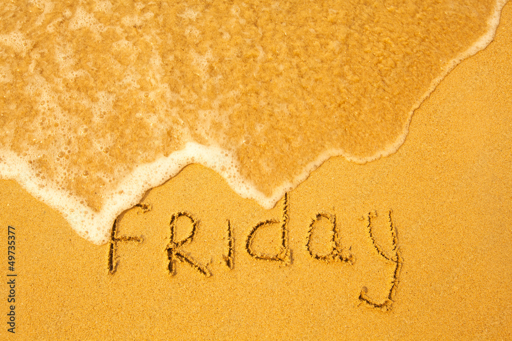 Fototapeta premium Friday - written in sand on beach texture(days week series)