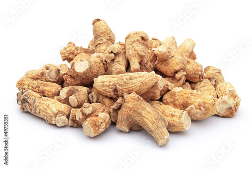 ginseng stack up on a white background photo
