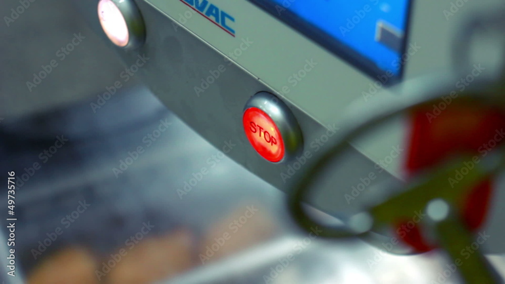 Pushing stop button turns on and off conveyor belt. Stock ビデオ | Adobe Stock