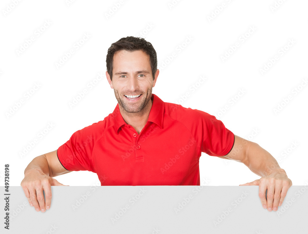 Portrait of soccer player presenting empty banner Portrait of soccer player presenting empty banner