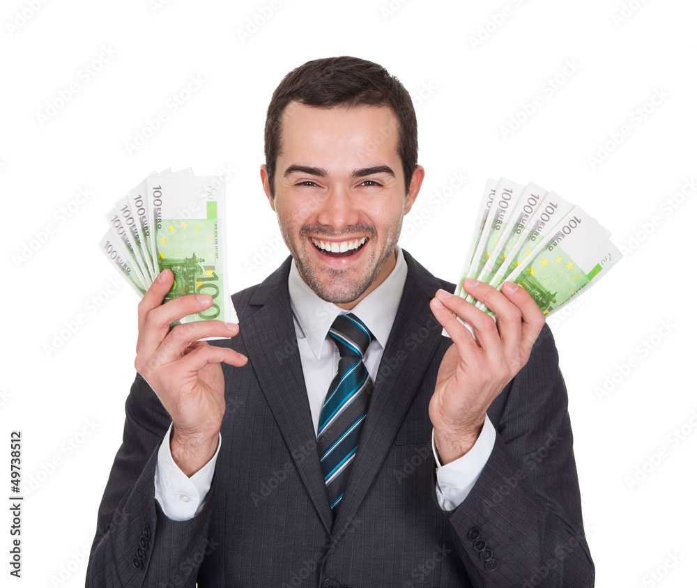 Excited businessman holding euro notes Excited businessman holding euro notes