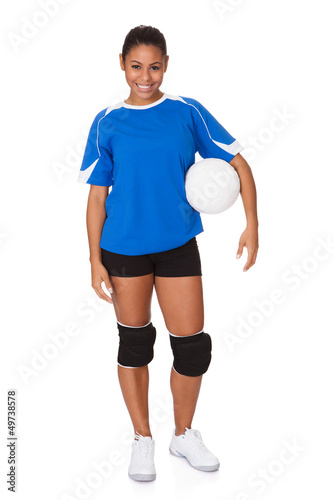 Young Girl Holding Volleyball