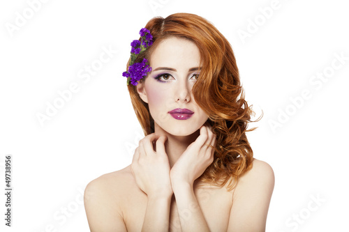 Redhead girl with flower  isolated.
