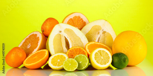 Lots ripe citrus isolated on white
