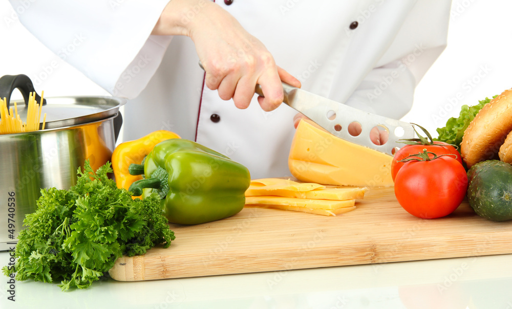 Female hands cutting cheese, isolated on white Female hands cutting cheese, isolated on white