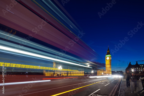 Big Ben behind light beams at twilight time  London  UK