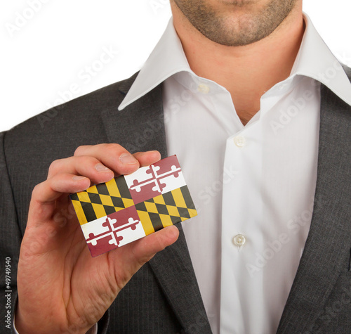 Businessman is holding a business card, Maryland photo