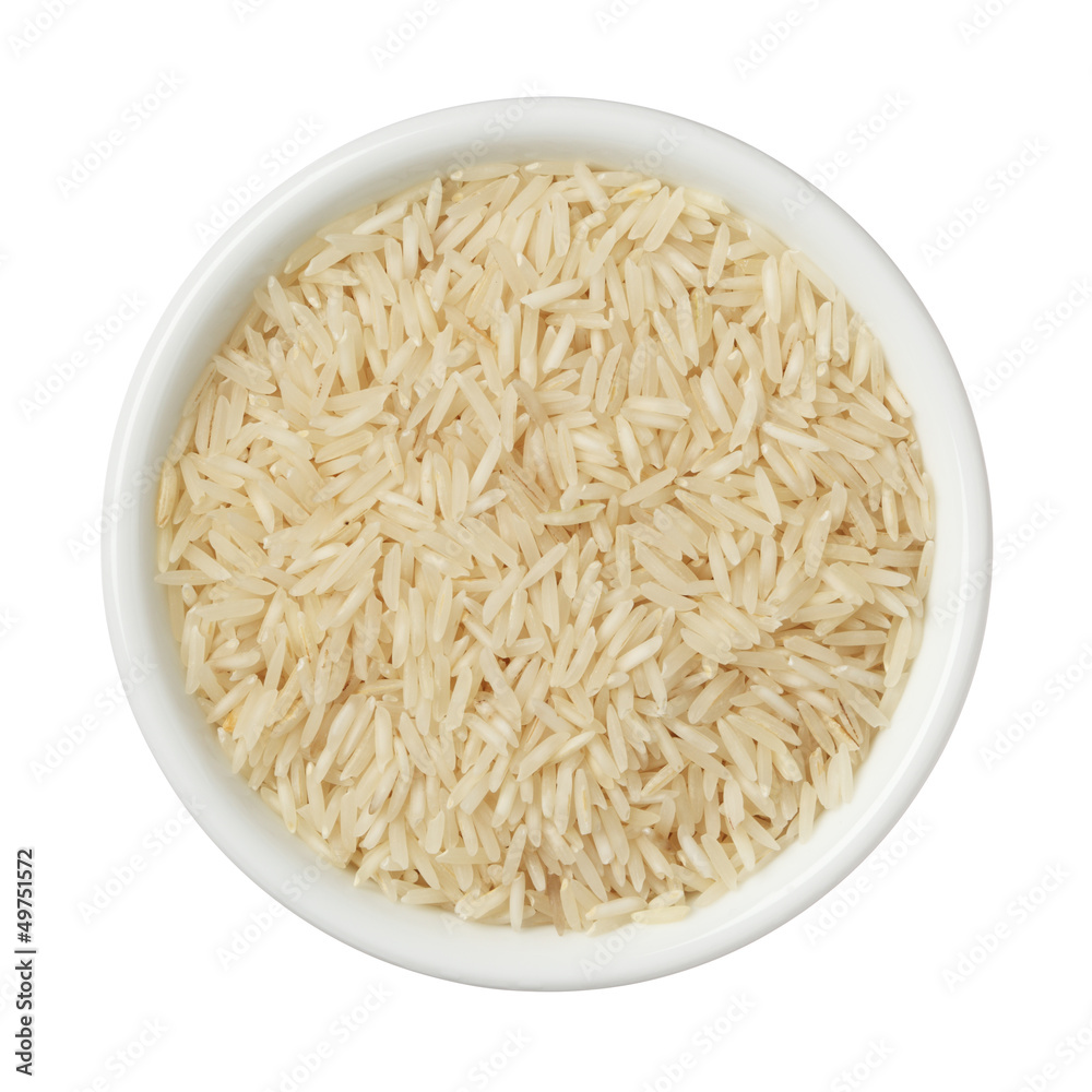Basmati rice in a bowl isolated on white background Basmati rice in a bowl isolated on white background