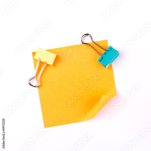 Orange sticky paper note with clips