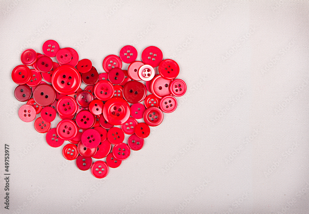 Red buttons in shape of heart Red buttons in shape of heart