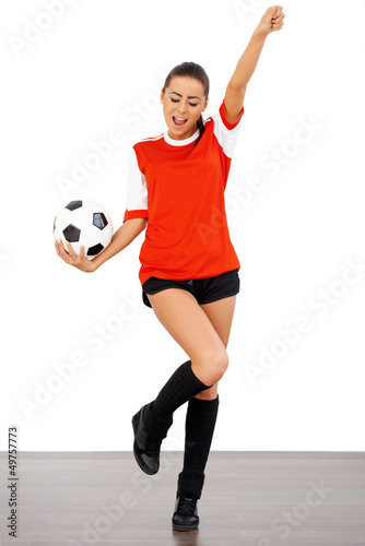 Happy female soccer player © Dash