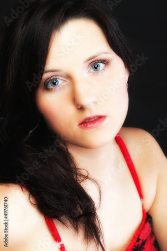 Portrait attractive young woman on black