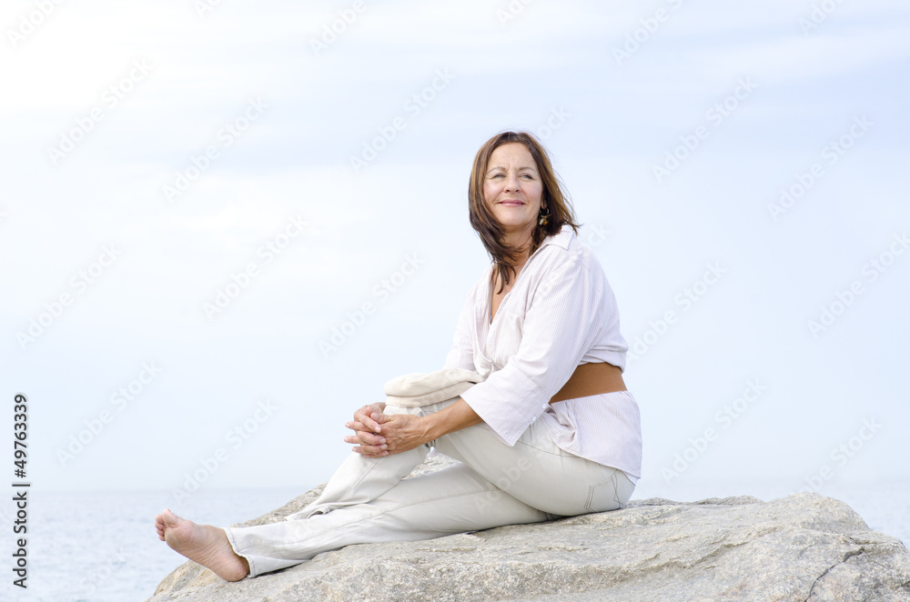 Mature woman happy relaxed outdoor isolated