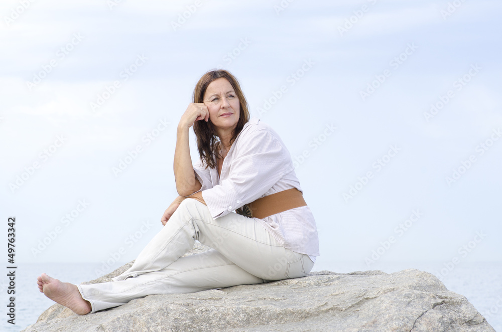 Mature woman serene relaxed outdoor isolated