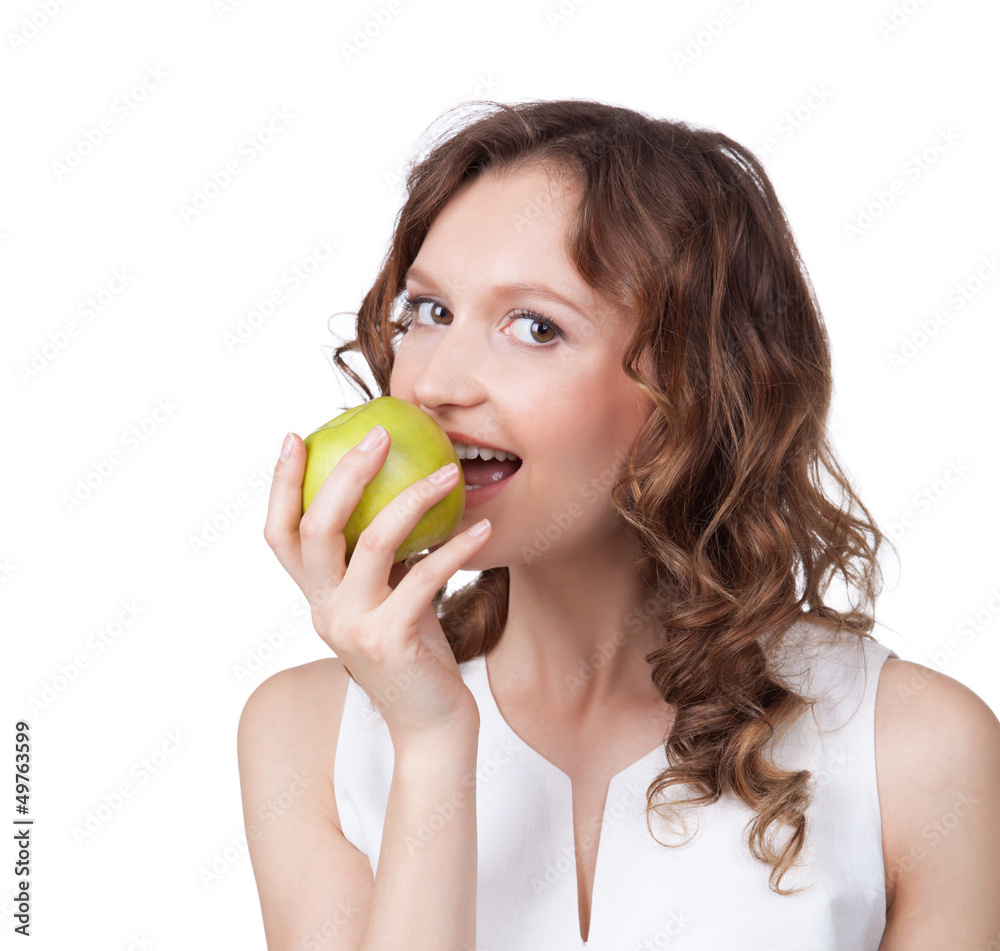 Portrait of fit young girl biting a fresh ripe apple Portrait of fit young girl biting a fresh ripe apple