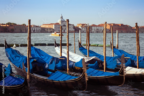 pier with the gondolas in Venice