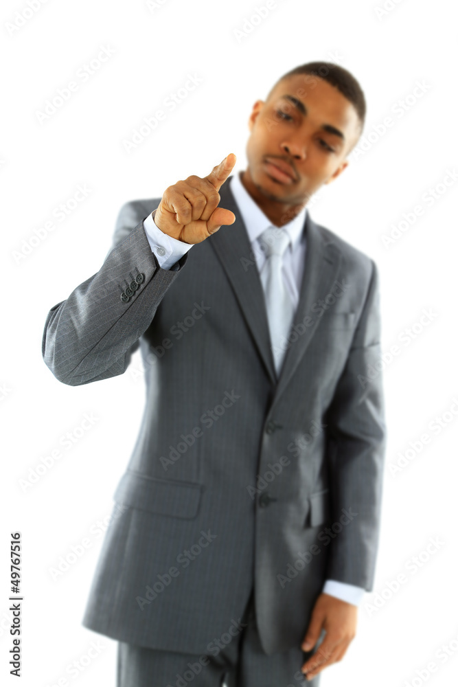 Businessman pointing at something on white background Businessman pointing at something on white background