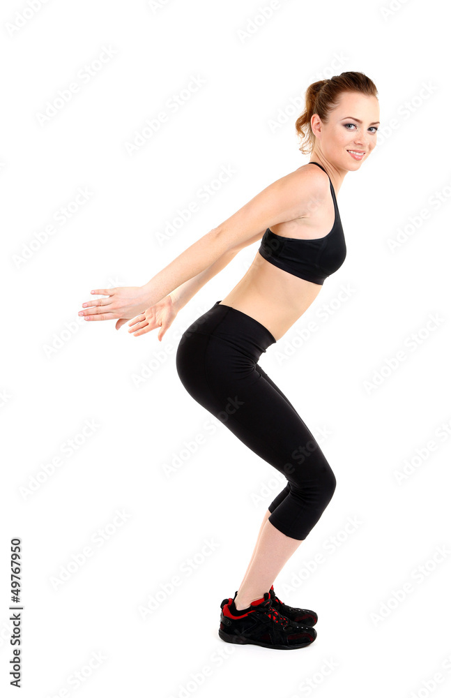 Young woman doing fitness exercises isolated on white