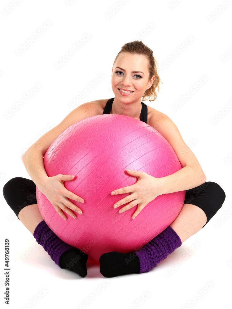 Young woman with gym ball isolated on white Young woman with gym ball isolated on white