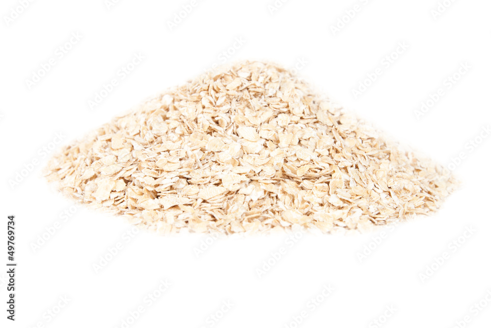 pile of oatmeal isolated on white pile of oatmeal isolated on white