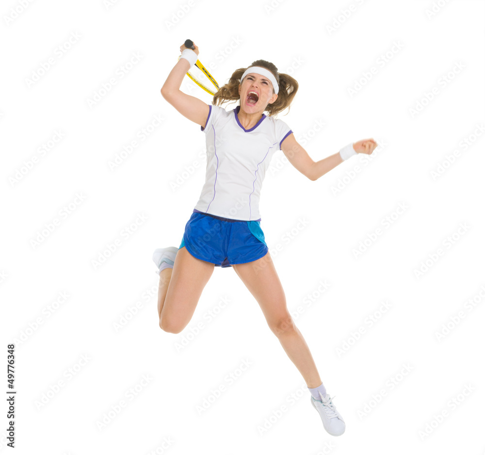 Fierce tennis player jump to hit ball Fierce tennis player jump to hit ball