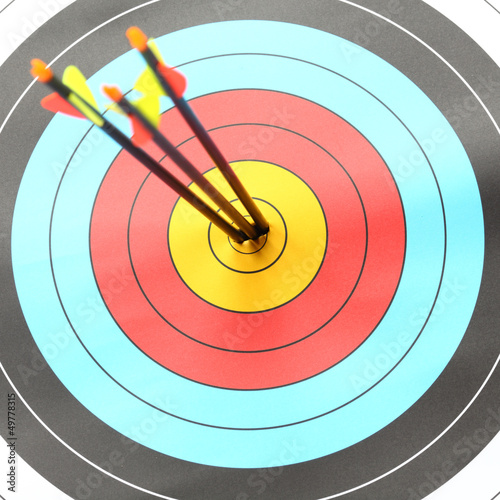 Three Arrow hit goal ring in archery target