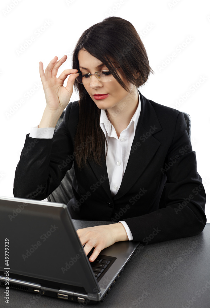 Businesswoman working on a laptop Businesswoman working on a laptop