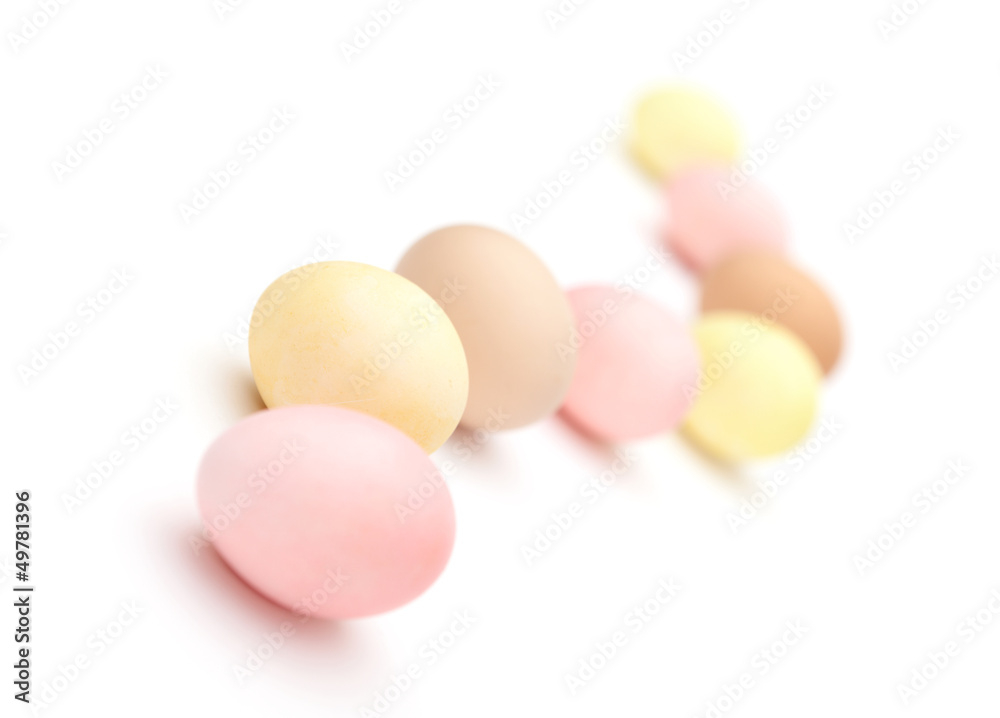 Serpentine of multicolored hen's eggs, isolated on white Serpentine of multicolored hen's eggs, isolated on white