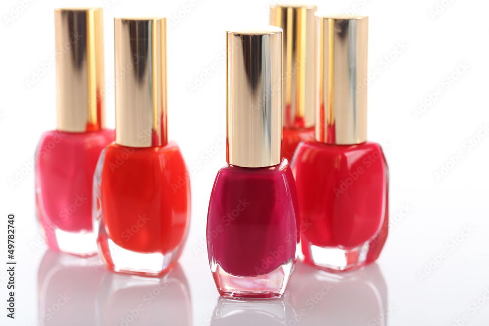 Woman in a nail salon receiving a manicure Woman in a nail salon receiving a manicure