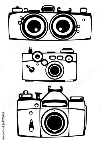 set of three vintage film photo cameras isolated on white