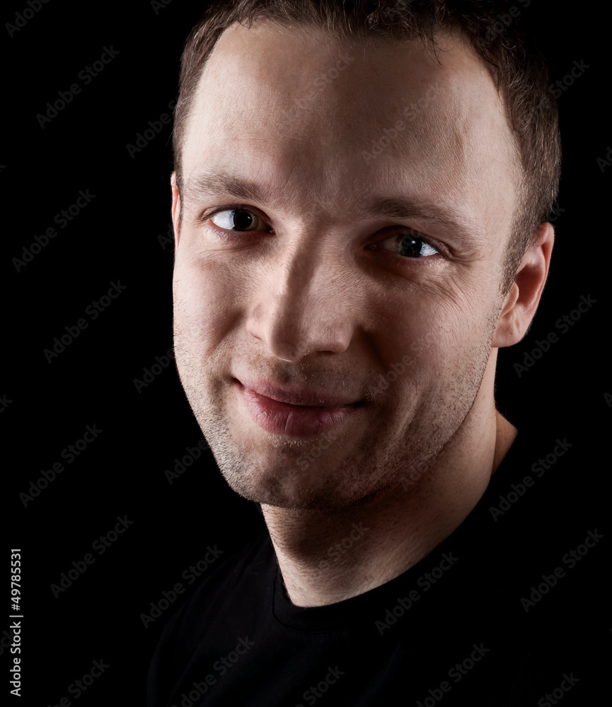 Obraz premium Portrait of young smiling Caucasian man