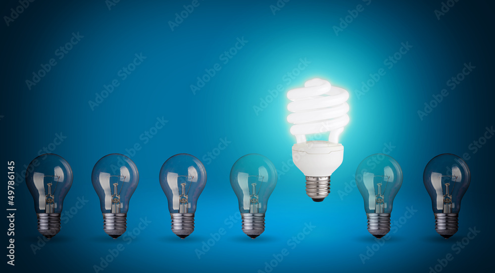 Row with light bulbs and energy save bulb. Idea concept Row with light bulbs and energy save bulb. Idea concept