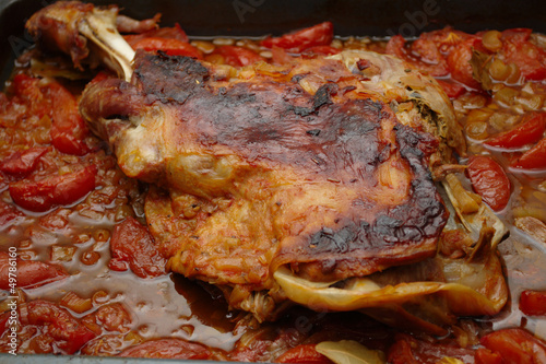 Delicious lamb shoulder with tomatoes and onions