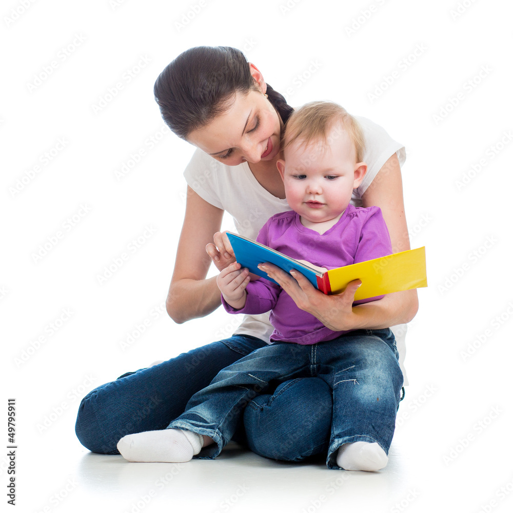 happy mother reading a book to kid girl happy mother reading a book to kid girl