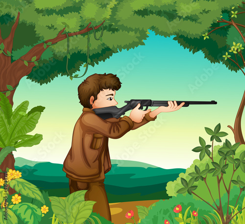 A boy with a gun inside the forest