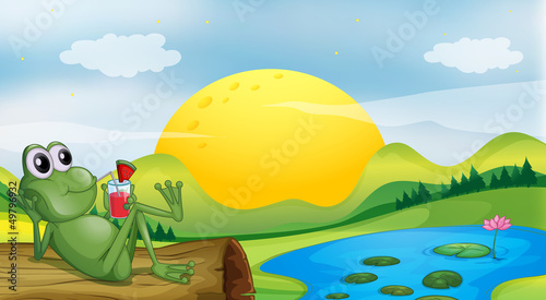 A frog with a glass of juice