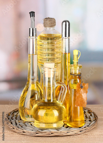Different types of oil on table in kitchen