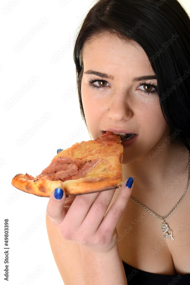 Young happy woman eating pizza, isolated on white Young happy woman eating pizza, isolated on white