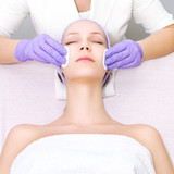 Young woman receiving beauty therapy