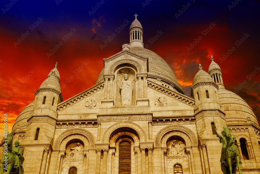 Beautiful sunset colors over Sacred Heart Cathedral in Montmartr