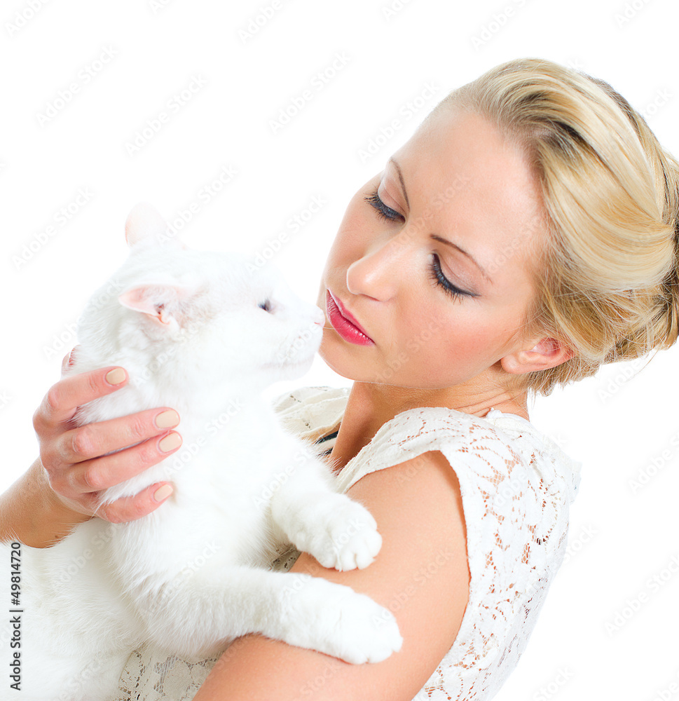 Young woman holding white cat. Isolated on white Young woman holding white cat. Isolated on white